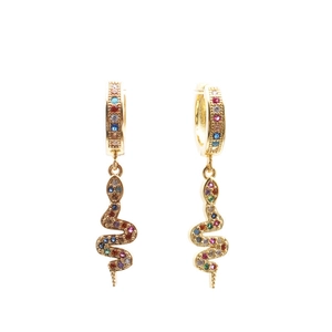 Detailed view of gold snake earrings featuring multi-color cubic zirconia gemstone accents