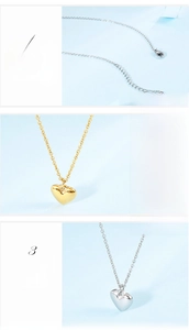 Detail view of heart pendant necklace with adjustable chain and lobster clasp