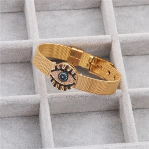Golden mesh strap bracelet with evil eye charm featuring blue and white zircon stones