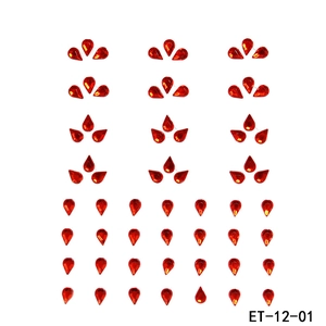 Detail showing red teardrop adhesive rhinestones for face and body DIY decoration