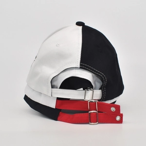 Close-up of baseball cap back with dual white and red adjustable straps and metal buckles