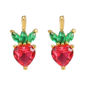Detail of gold-plated strawberry pendant with red heart-shaped zircon and green leaves