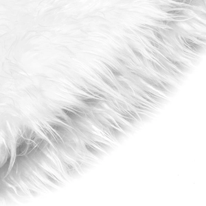 Detail of the soft white faux fur plush material on the Christmas tree skirt