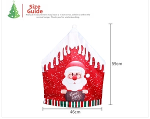 Detailed view showing a 46x59cm Christmas chair cover with Santa and Warm Wishes sign