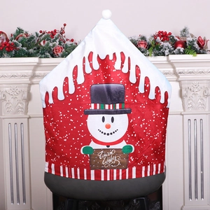 Snowman Christmas chair cover with Warm Wishes sign and festive fireplace background