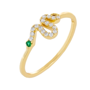 Macro view of gold snake ring with white cubic zirconia pavé and green gemstone eyes