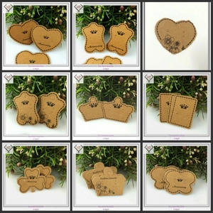 Detailed grid showing assorted kraft paper jewelry display cards in various shapes