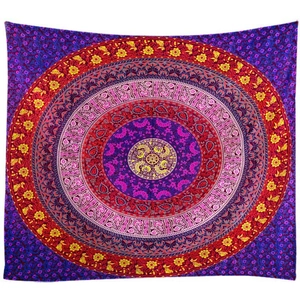 Bohemian mandala wall tapestry in purple and red with intricate yellow floral patterns