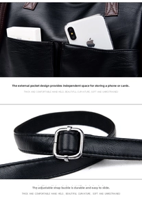 Detail of black leather bag showing outer phone pocket and adjustable silver metal buckle