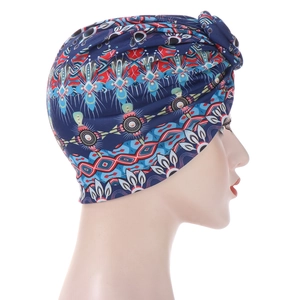 Detailed side view of women's ethnic print turban with navy and red geometric patterns