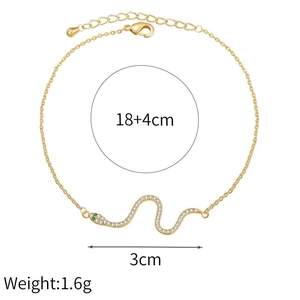 Detail of gold snake pendant with green zircon eyes and 18+4cm adjustable chain length
