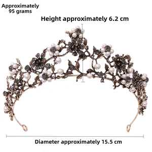 Detail view of Baroque bridal crown with black crystals, pearls and vintage flower patterns