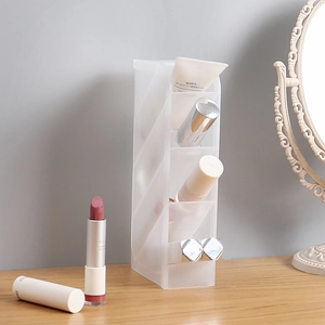 Minimalist white frosted desktop storage box with tilted compartments for stationery and brushes