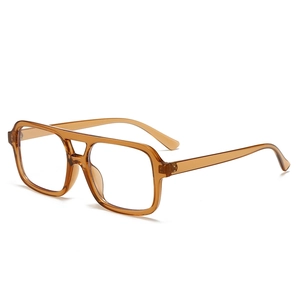 Modern double bridge square sunglasses with amber transparent frames and clear lenses