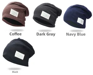 Detailed knit beanies in black, gray, navy, and brown with 'The FASHION' label tag