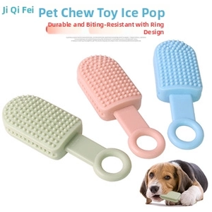 Detail view of popsicle-shaped pet teething toys in mint green, pink and blue colors