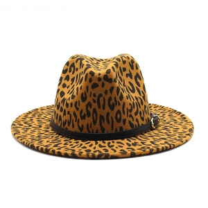 Close-up of leopard print fedora hat featuring a black faux leather band with metal buckle