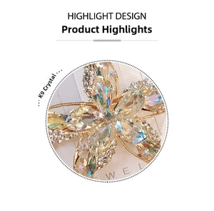 Detailed macro view of K9 crystal petals and rhinestones on the golden starfish hair clip