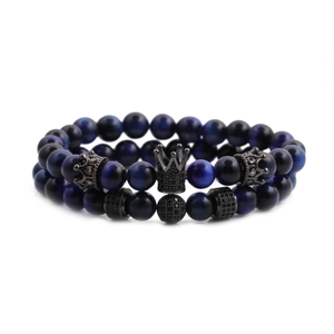 Mens 8mm blue tiger eye stone and black lava bead crown bracelet set on white background