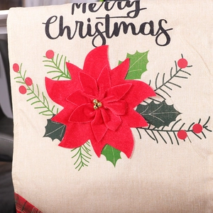 Linen Christmas table runner with red poinsettia and green pine needles decoration
