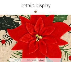 Nahaufnahme des 3D-Weihnachtsstern-Platzsets aus Stoff mit Goldperlen und Stechpalmen