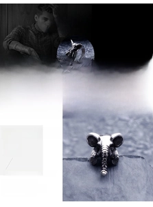 Macro detail of 316L stainless steel elephant head ring with vintage punk finish