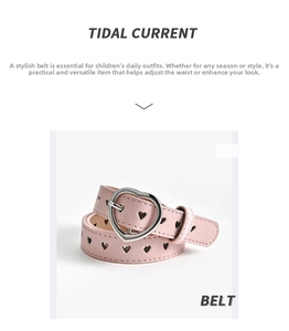 Detail of pink faux leather belt with silver heart buckle and heart-shaped punch holes