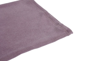 Close-up of premium fleece stitching on the purple thermal neck warmer and hat set