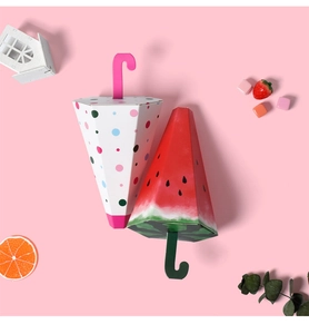 Creative umbrella-shaped candy boxes with polka dot and watermelon patterns