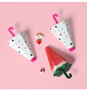 Creative umbrella-shaped candy gift boxes with colorful polka dots and watermelon patterns