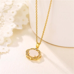 Elegant gold octagonal pendant necklace featuring a pink oval stone and zircon accents