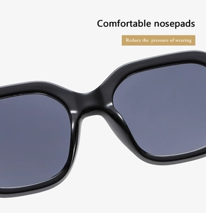 Detail of comfortable integrated nose pads on black square sunglasses for pressure-free wear