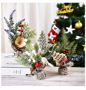 Close-up of mini artificial Christmas plants with berries, pine cones and rustic bases