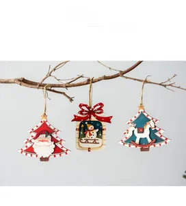 Detailed view of hand-painted wooden Christmas ornaments with Santa and Snowman motifs