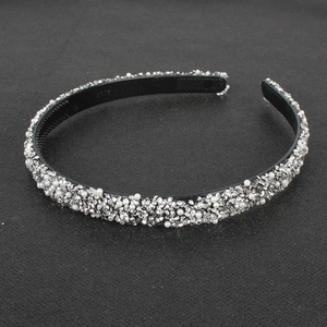 Detail shot of the anti-slip inner teeth and sparkling rhinestones on the headband