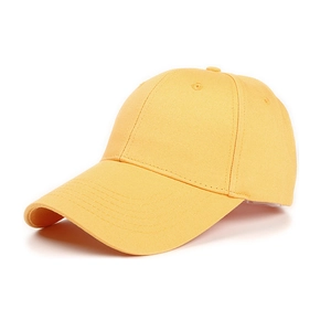 Detailed close-up of yellow cotton twill baseball cap with reinforced stitching and eyelets