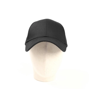Front view of a structured black cotton baseball cap on a professional head form mannequin