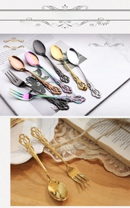 Detailed view of vintage embossed stainless steel dessert spoons and forks in multiple colors