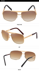 Detail of brown gradient lenses and gold metal frames with checkered pattern temples