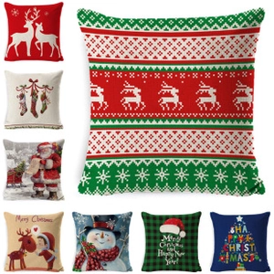 Detail showing various Christmas pillow covers with festive knit patterns and slogans
