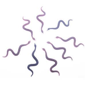 Detailed view of eight realistic rubber snakes in purple, blue and black for party