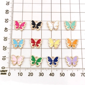 Set of 12 colorful alloy butterfly pendants for DIY jewelry making with ruler scale