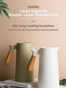 Detail of 1000ml thermal carafes in olive green and ivory with wood grain handles