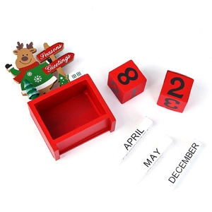 Wooden Christmas countdown calendar featuring Santa and snowman blocks for tabletop decor