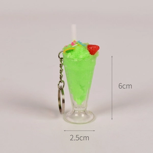 Detail view of mini ice cream sundae keychain with dimensions 6cm by 2.5cm