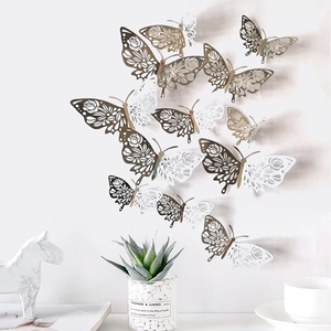 Set of 12 gold and silver hollow 3D butterfly wall stickers for home party decoration