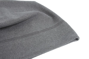 Detailed macro view of dark grey fleece fabric with high-quality double stitching