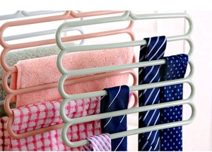 Close-up of 5-tier plastic multi-layered pants rack for ties, towels and scarves