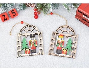 Detail of wooden Christmas ornaments featuring nutcrackers and laser-cut window designs
