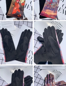 Detail view of winter gloves with touchscreen fingertips and colorful oil painting prints